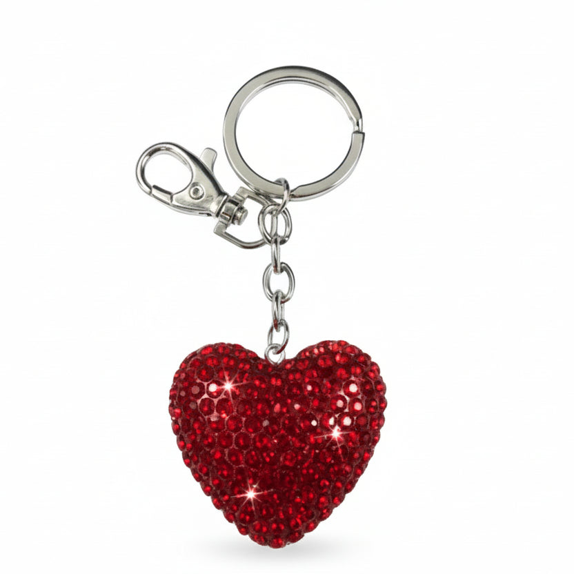 Red heart-shaped keychain with a silver clasp on a white background