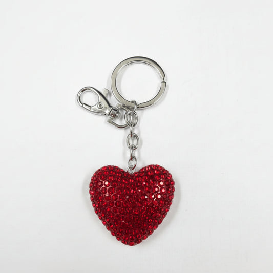 Red heart-shaped keychain with a silver clasp on a white background